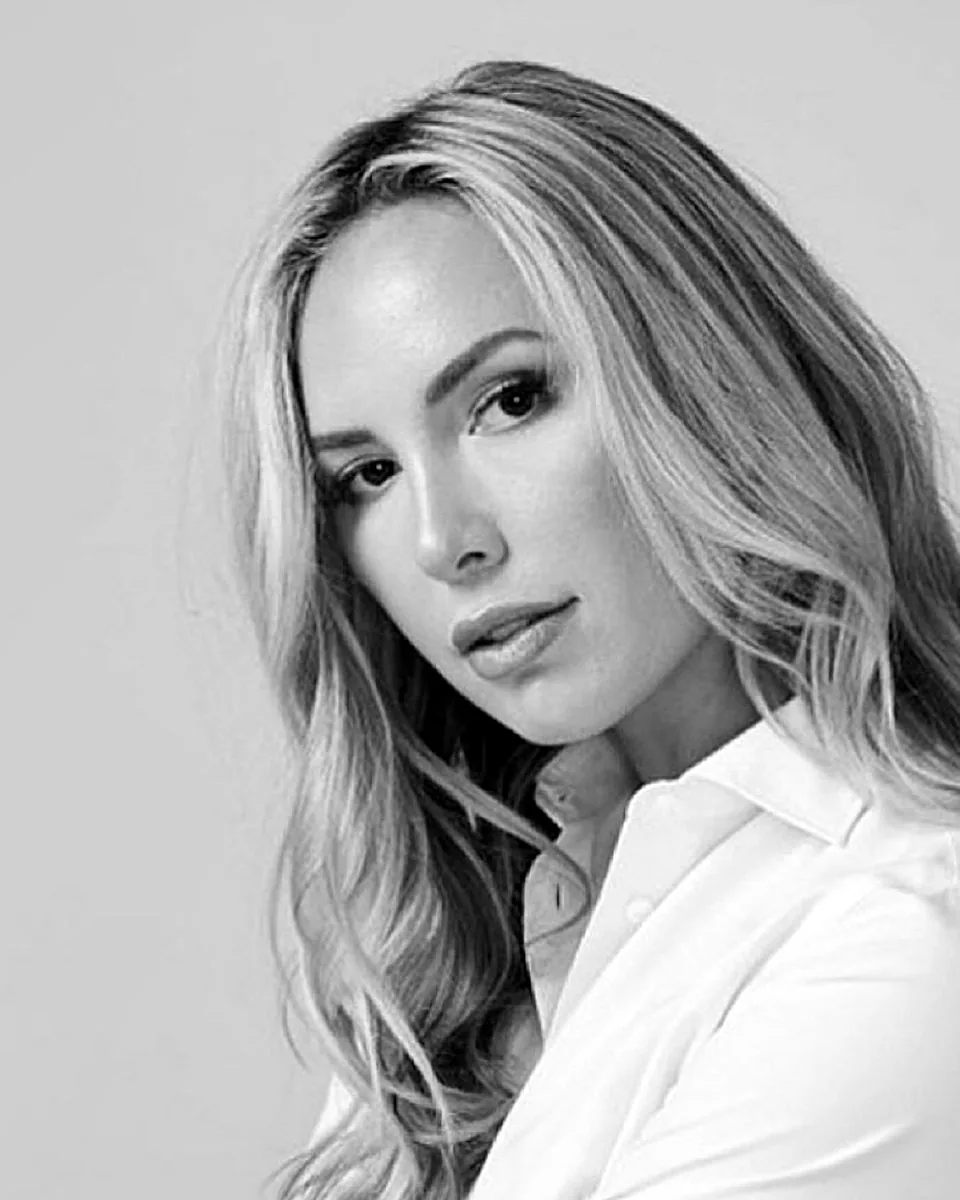 Black-and-white portrait of Katy Schraner, founder of SLK.